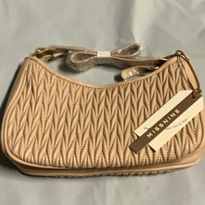 Tan Quilted Shoulder Bag with Chevron Pattern